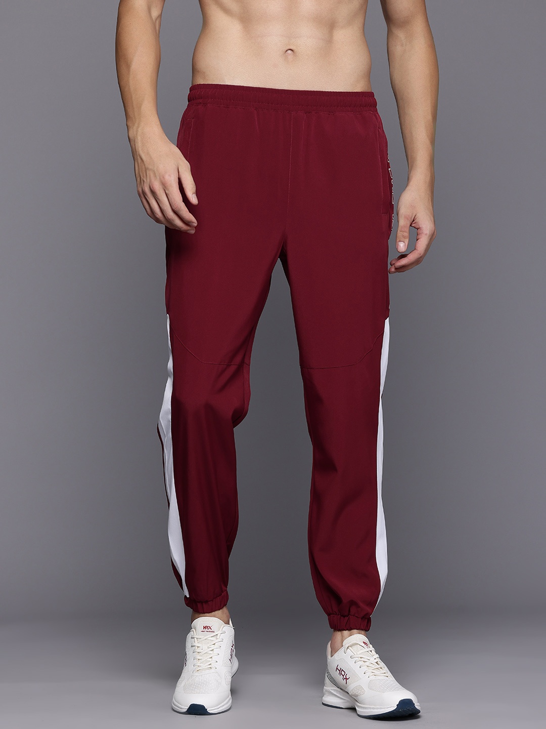 

HRX by Hrithik Roshan Men Newedit Typography Printed Rapid-Dry Training Joggers, Maroon