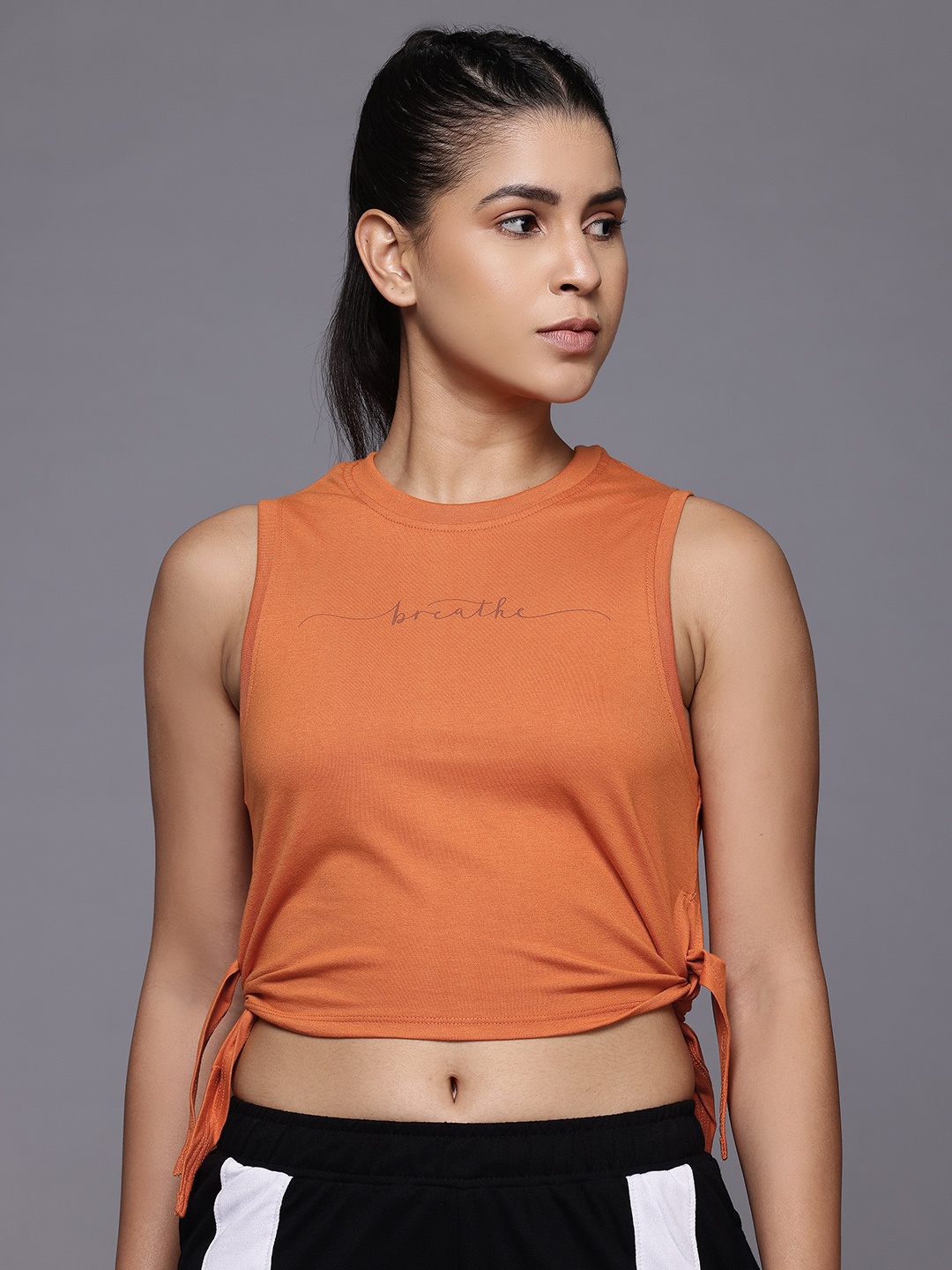 

HRX by Hrithik Roshan Typography Printed Waist Tie-ups Yoga T-shirt, Rust