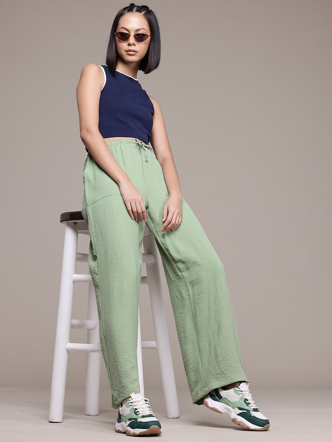

The Roadster Lifestyle Co. Women Regular-Fit Textured Trousers, Green