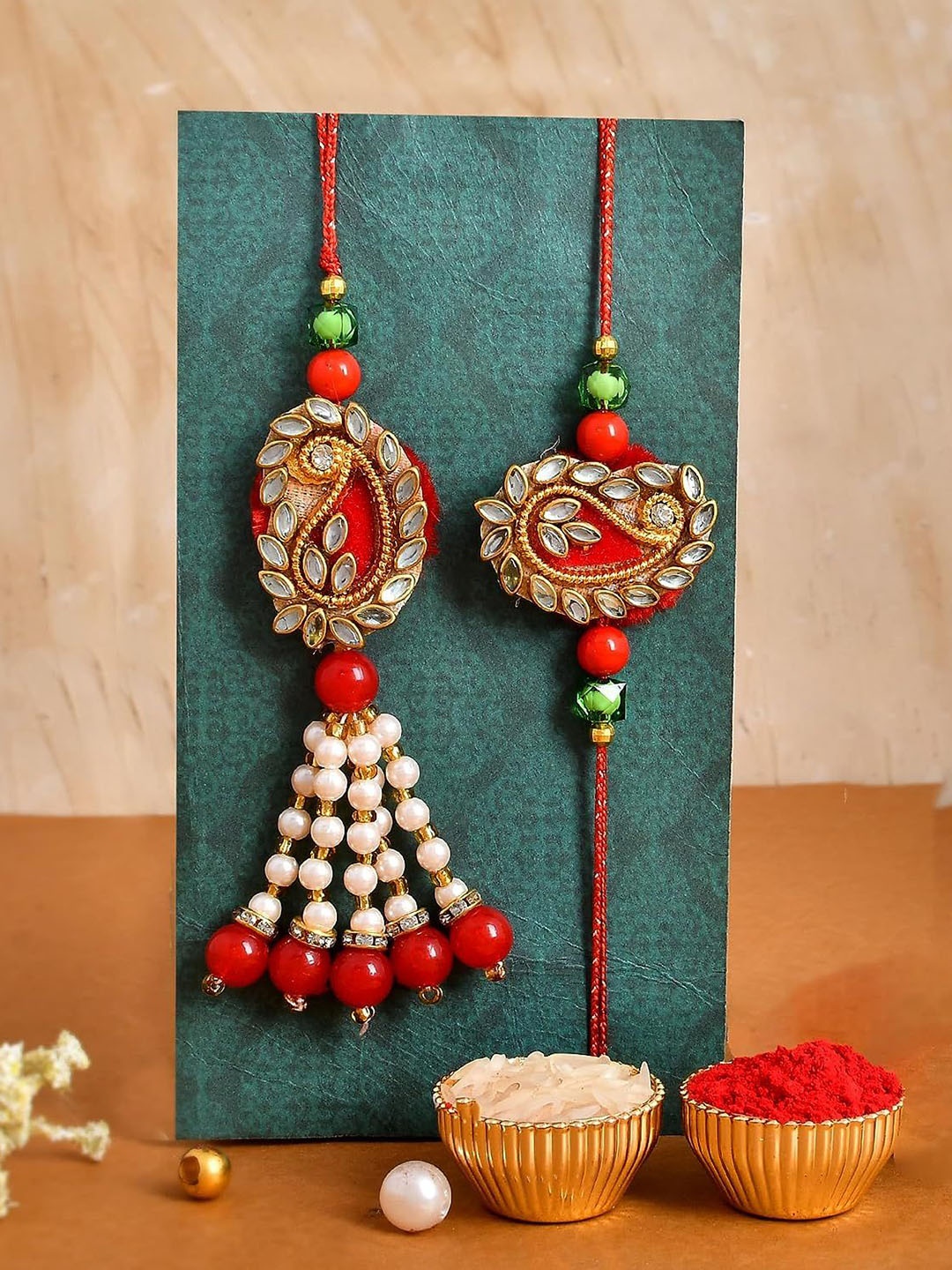 

CraftVatika Set Of 3 Stone-Studded & Beaded Rakhi With Pooja Thali Roli Rice & Greeting, Red