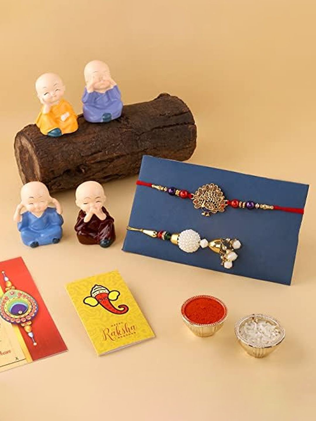 

CraftVatika Set Of 6 Stone-Studded & Beaded Rakhis With Idols Roli Rice & Greeting Card, Red