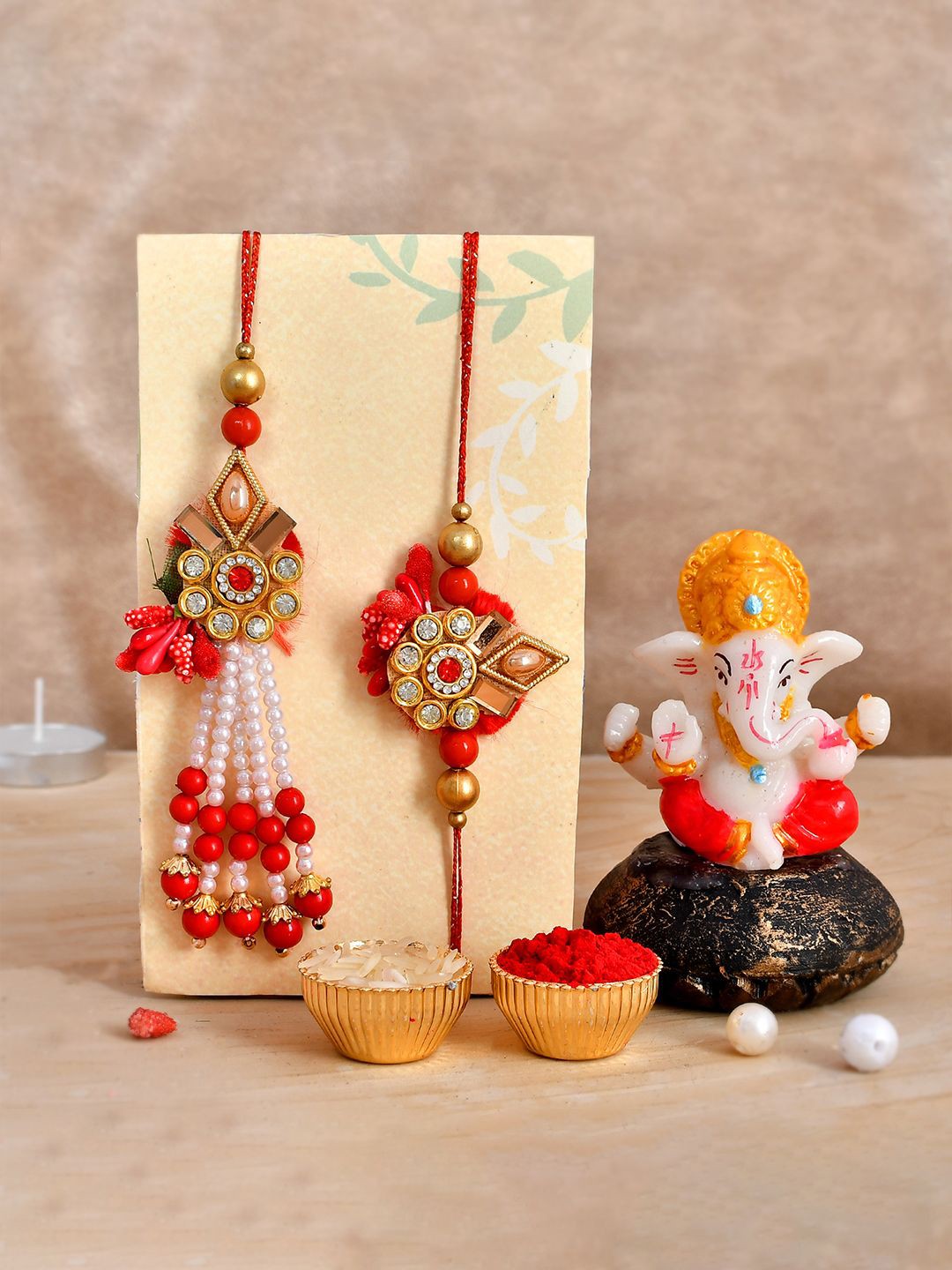 

CraftVatika Set Of 3 Stone Studded & Beaded Rakhi With Showpiece & Roli Chawal, Red