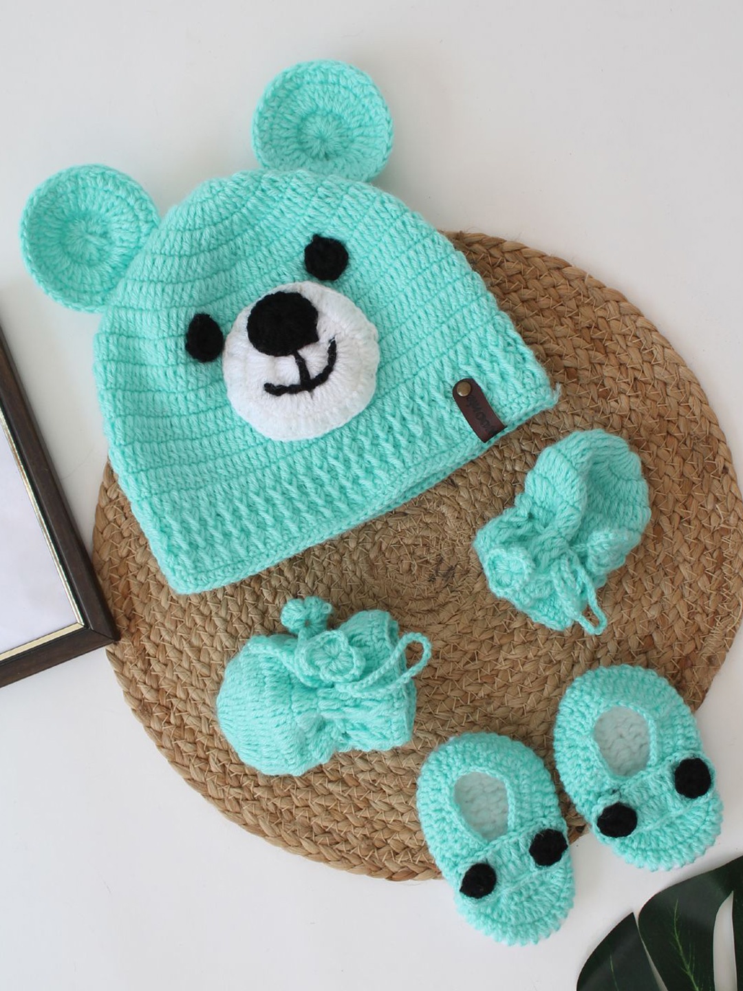 

Woonie Infants Self Design Acrylic Beanie Cap With Booties & Mittens, Turquoise blue