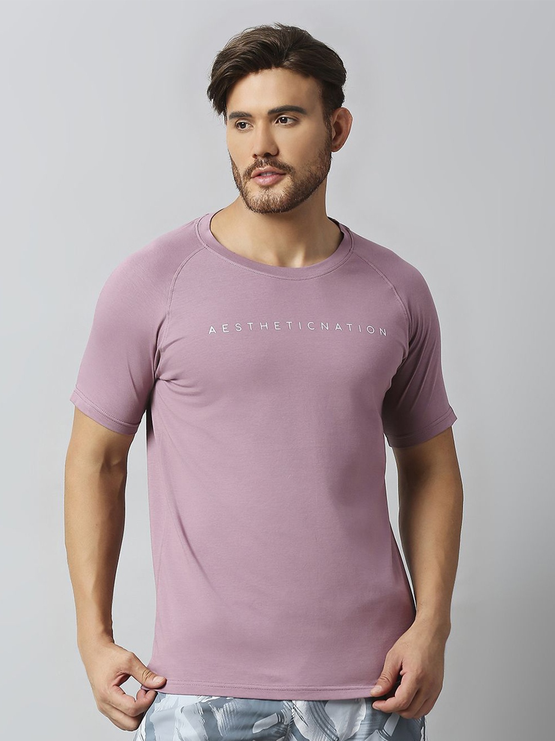 

AESTHETIC NATION Men Typography Printed Raw Edge T-shirt, Purple
