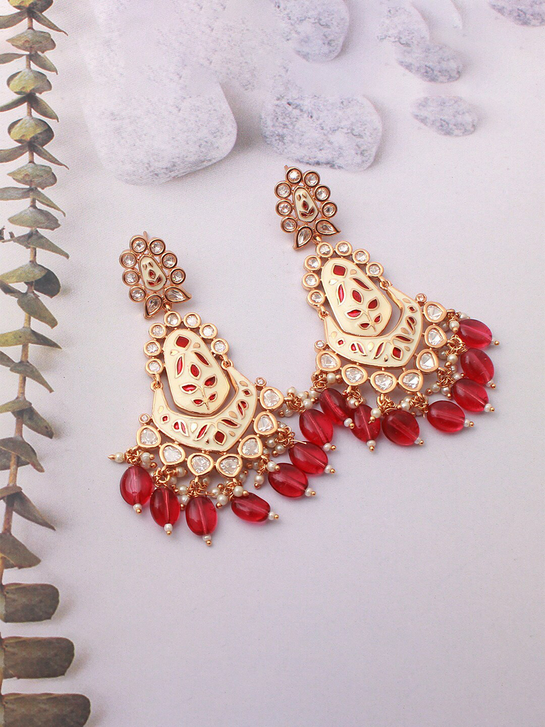 

Mirana Gold Plated Kundan Chandbalis