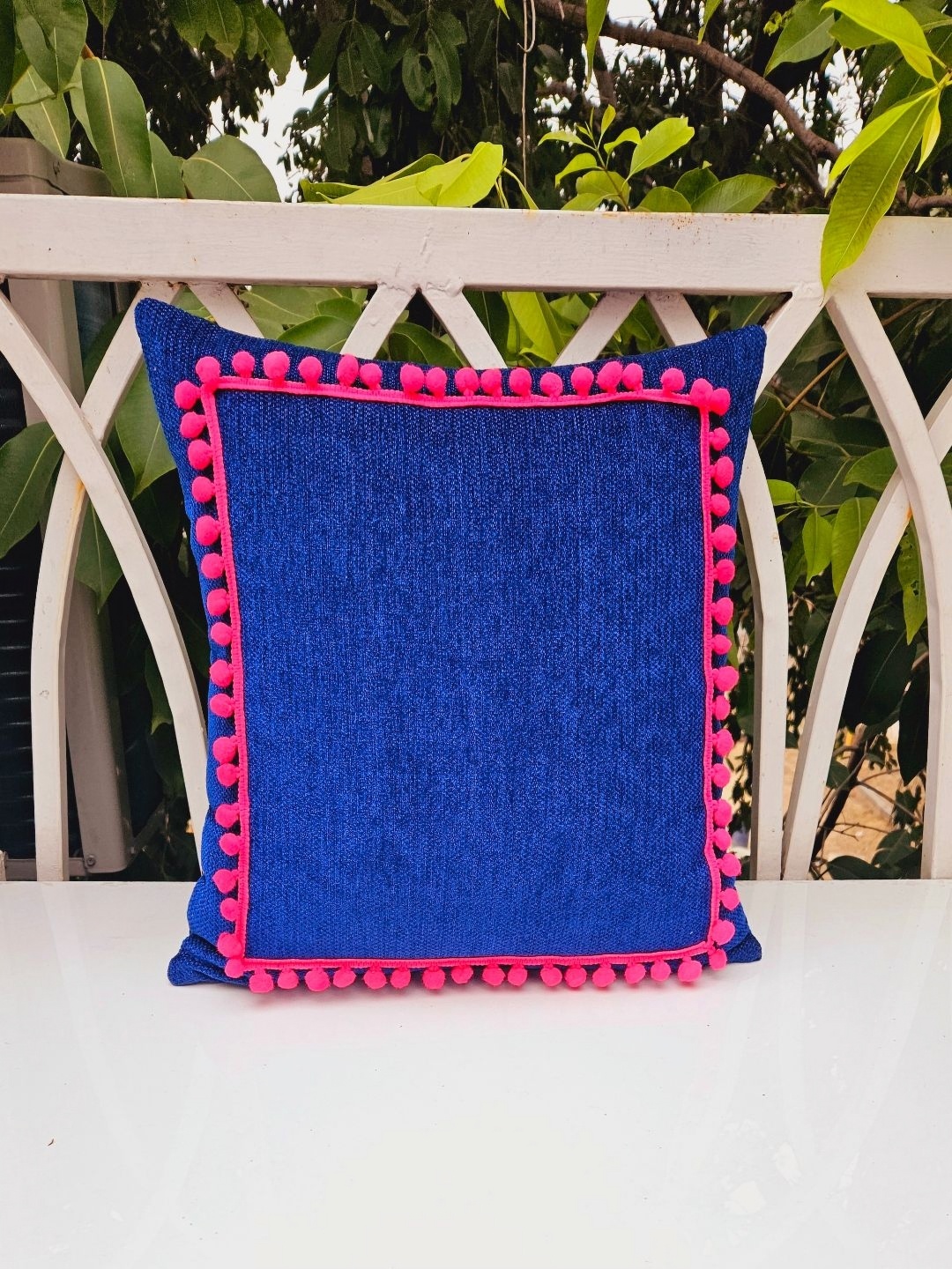 

THROWPILLOW Navy Blue & Pink Tasselled Square Cushion Cover