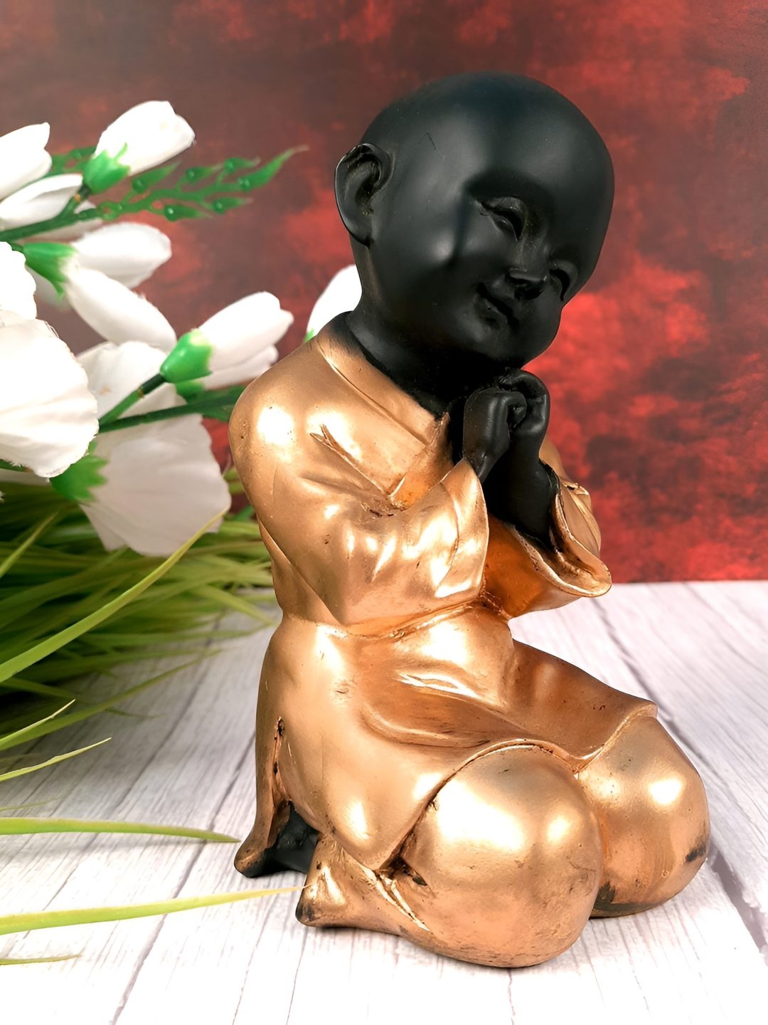 

apka mart Copper-Toned & Black Buddha Figurine Showpiece