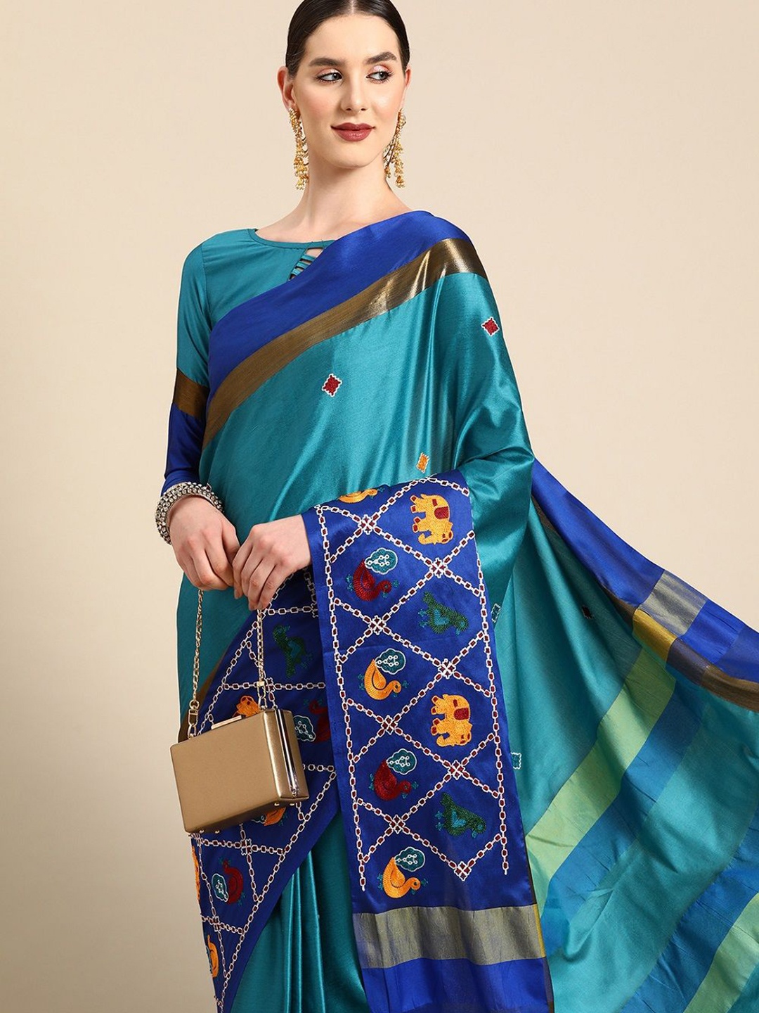 

KALINI Ethnic Motif Embroidered Zari Woven Patola Saree, Turquoise blue