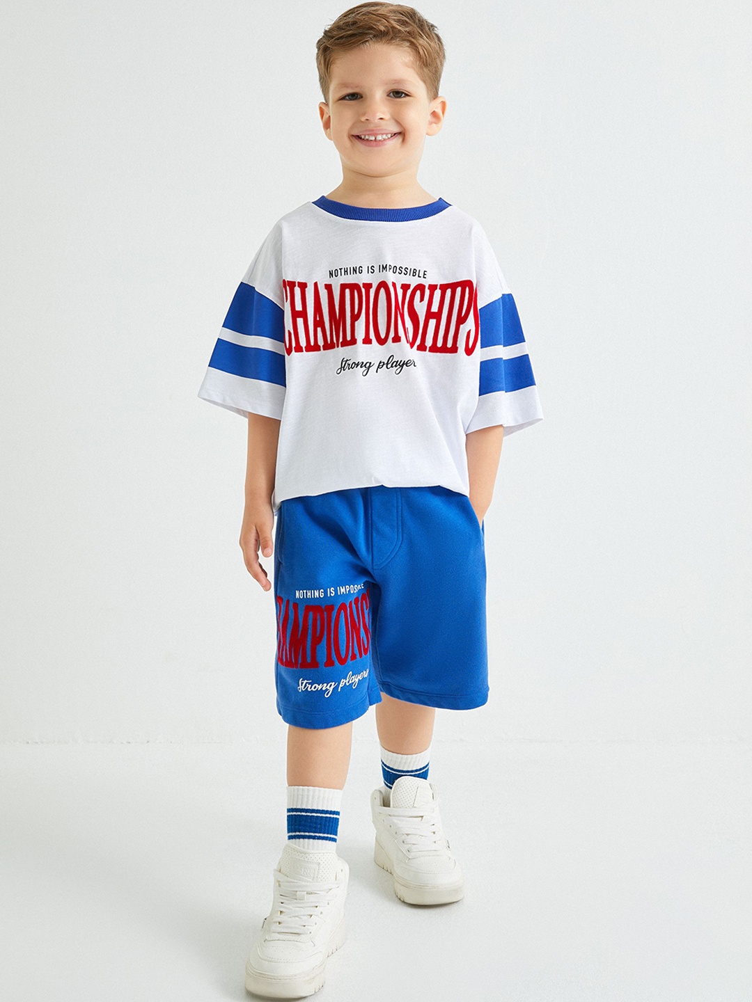 

Koton Boys Typography Printed Mid-Rise Pure Cotton Shorts, Blue