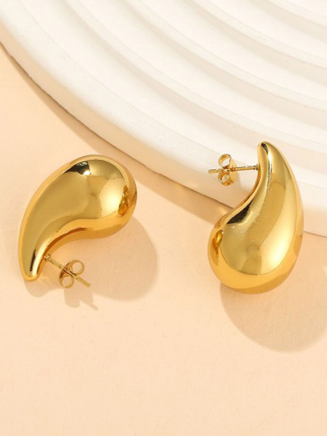 

Xivir Gold Plated Studs Earrings