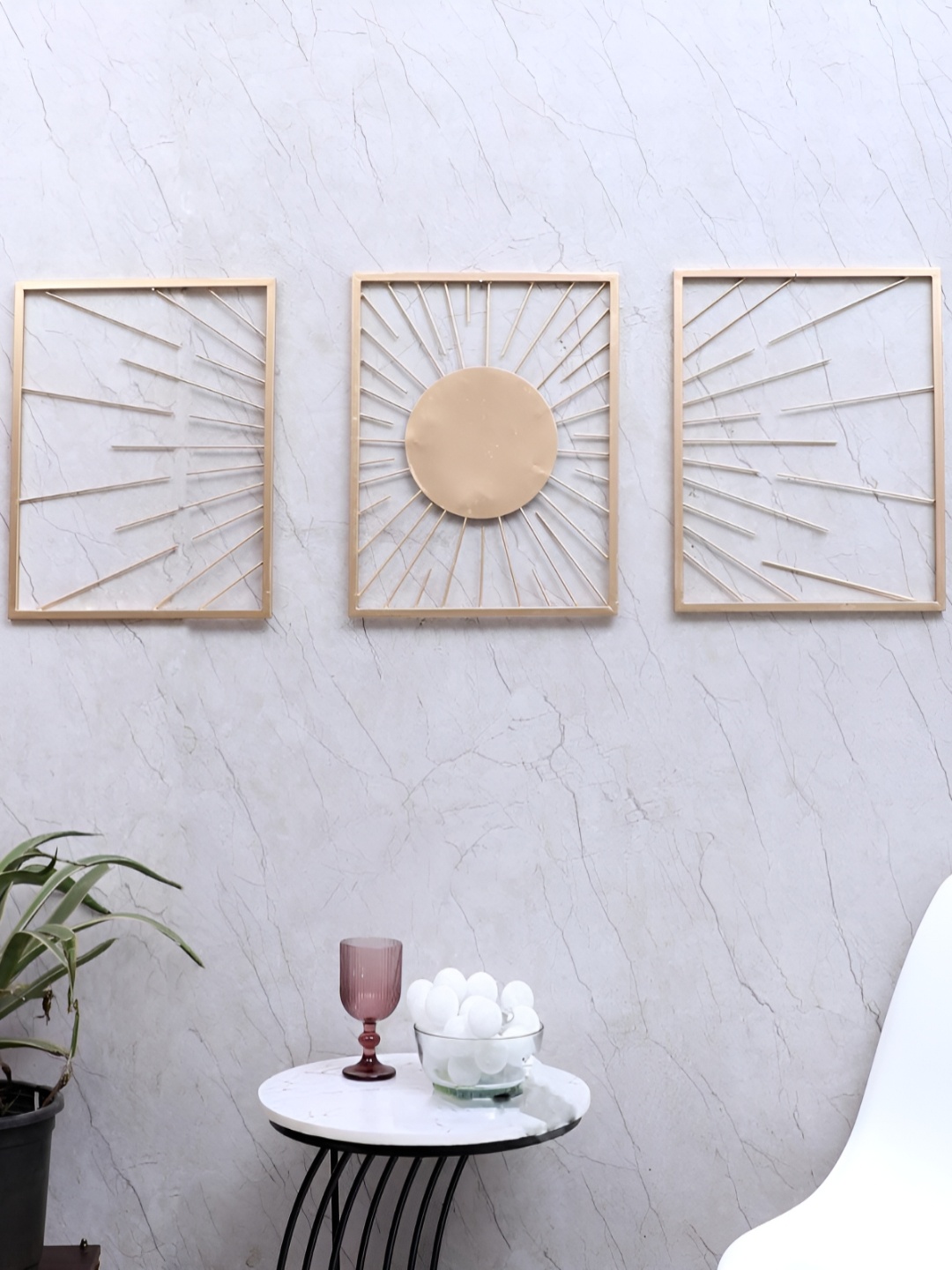 

Amaya Decors Gold toned 3 Pieces Metal Wall Decor