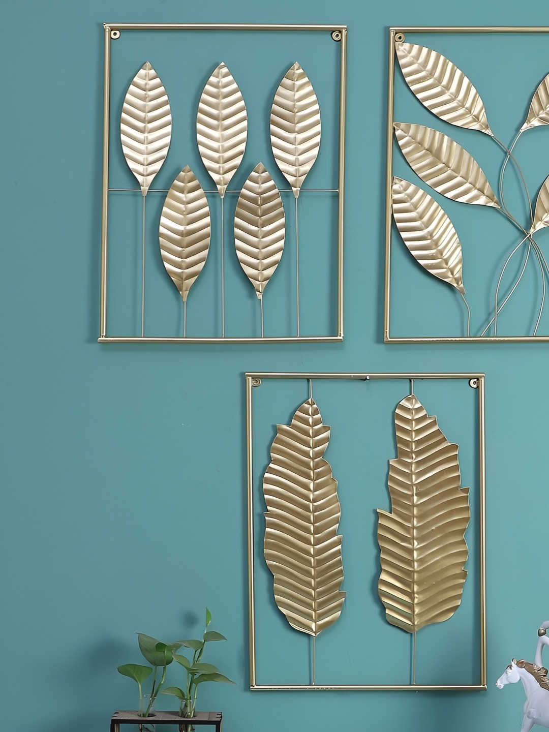 

Amaya Decors Gold toned 3 Pieces Metal Wall Decor