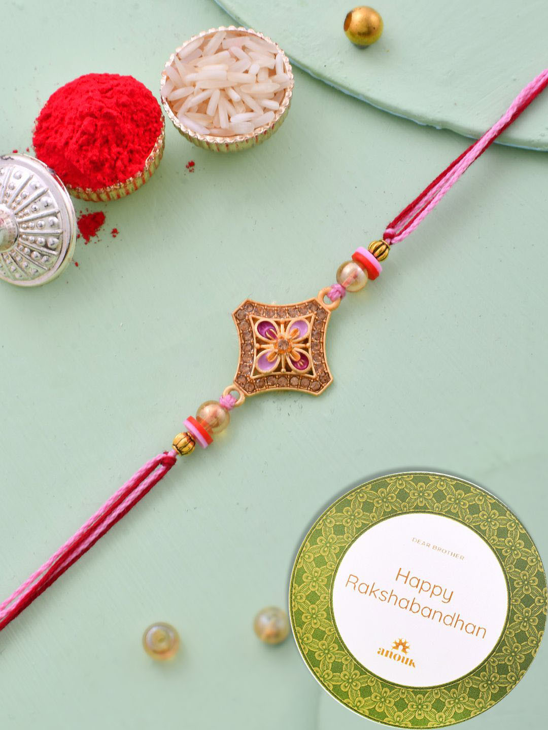 

Anouk Gold-Toned Stone-Studded & Beaded Thread Rakhi