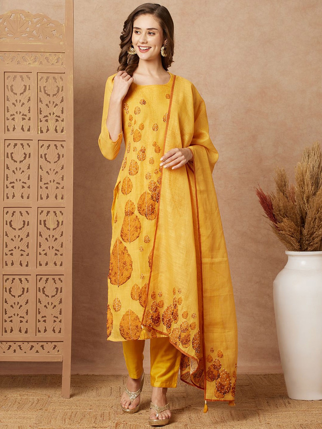 

FASHOR Floral Printed Thread Work Jute Cotton Straight Kurta With Trousers & Dupatta, Yellow