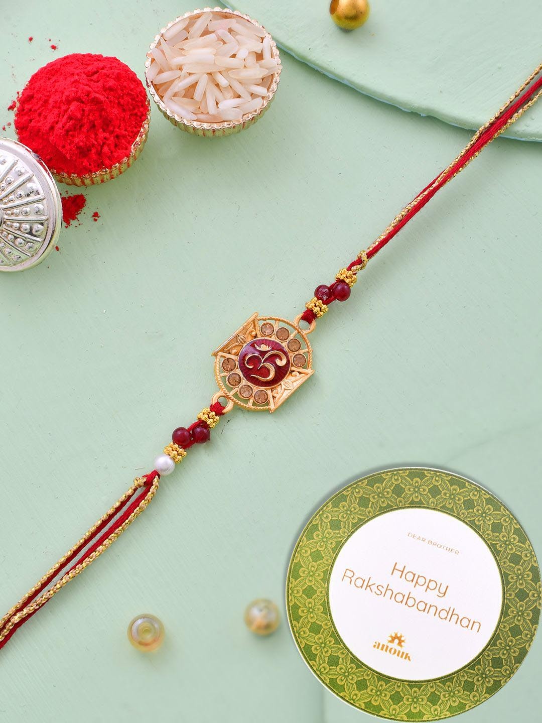 

Anouk Red Stone-Studded & Beaded Thread Rakhi