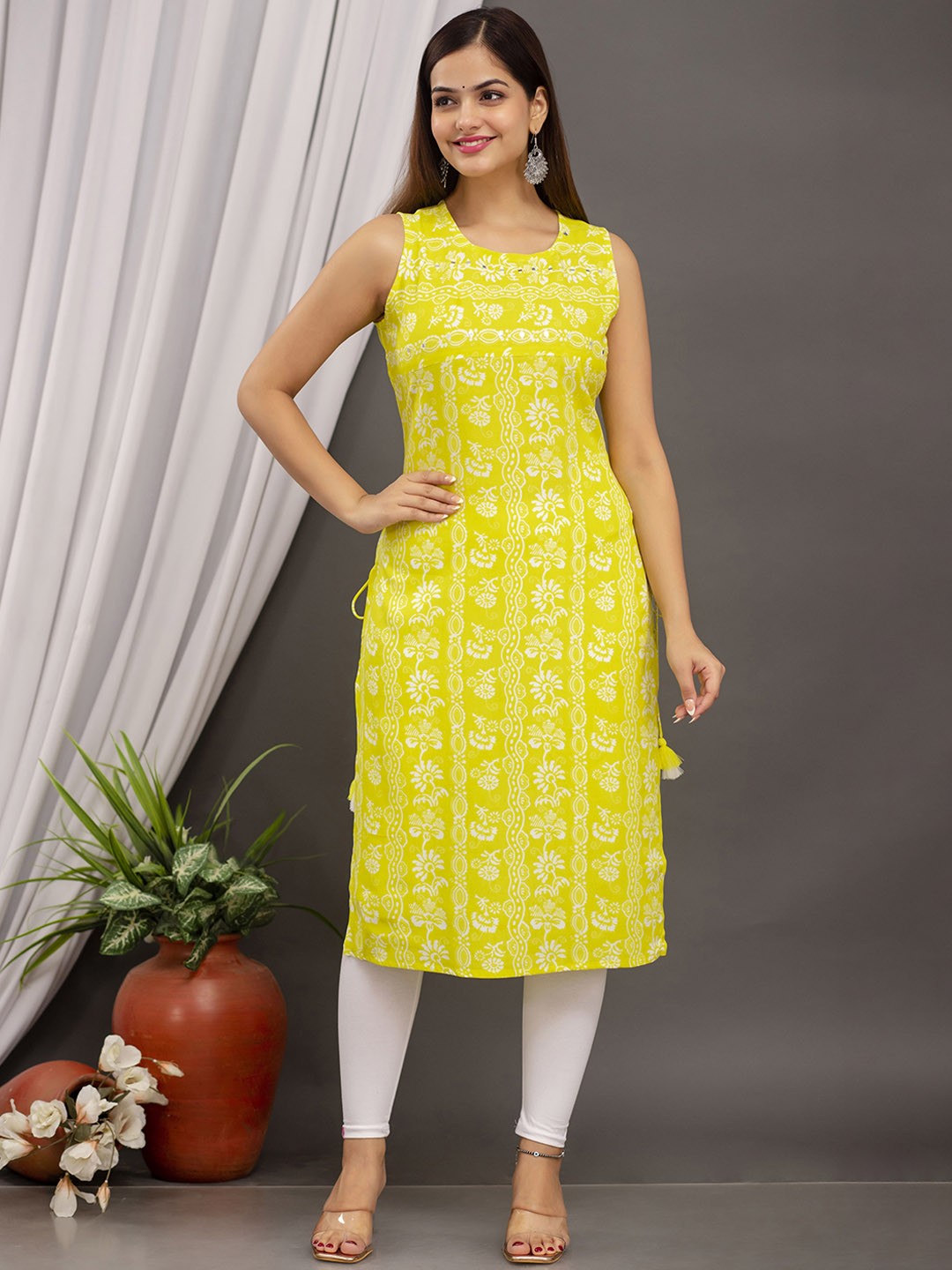 

MILAAV Floral Printed Sleeveless Mirror Work Straight Kurta, Yellow