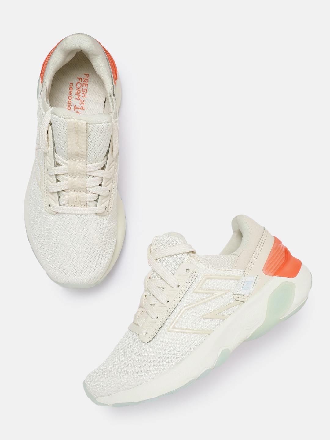 

New Balance Women Woven Design 1440 Running Shoes, Off white