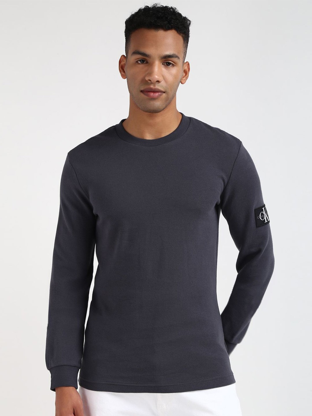 

Calvin Klein Men Solid Round Neck Applique T-shirt, Blue