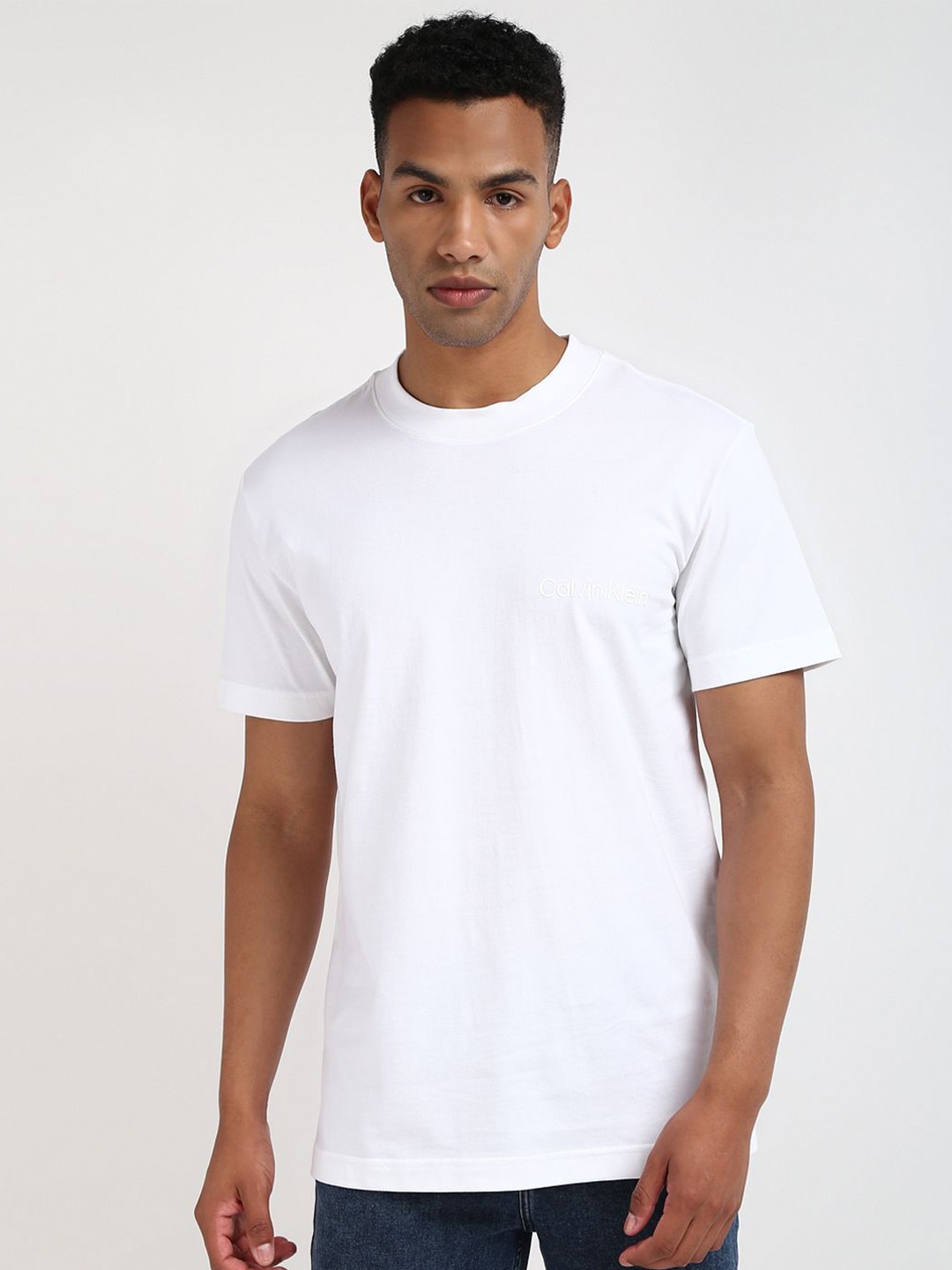 

Calvin Klein Jeans Men Solid Embroidered Brand Logo Round Neck Cotton T-shirt, White