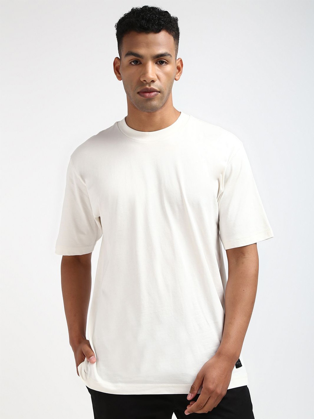 

Calvin Klein Jeans Men Solid Round Neck Cotton Oversized T-shirt, White