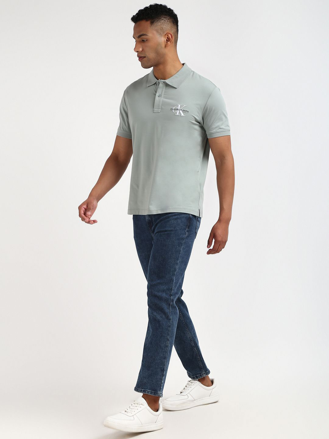 

Calvin Klein Men Solid Polo Collar Cotton T-shirt, Grey