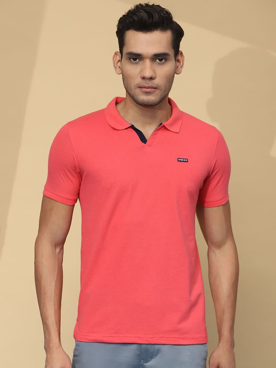 

Cloak & Decker by Monte Carlo Men Solid Polo Collar T-shirt, Coral