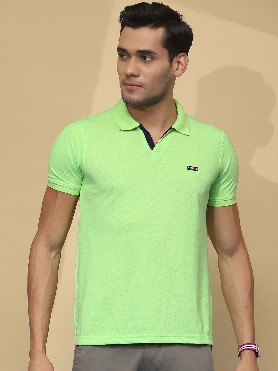 

Cloak & Decker by Monte Carlo Men Solid Polo Collar T-shirt, Fluorescent green