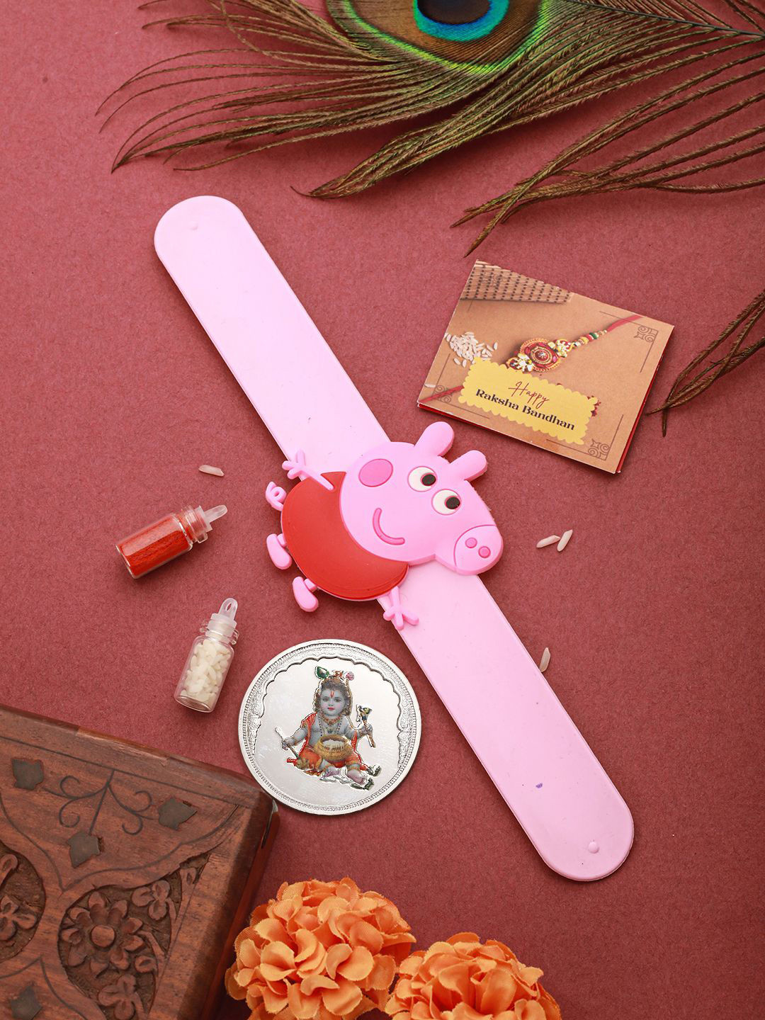 

Saraf RS Jewellery Boys Rakhis with Key Chain & 999 Silver Coin- 10 gram, Pink