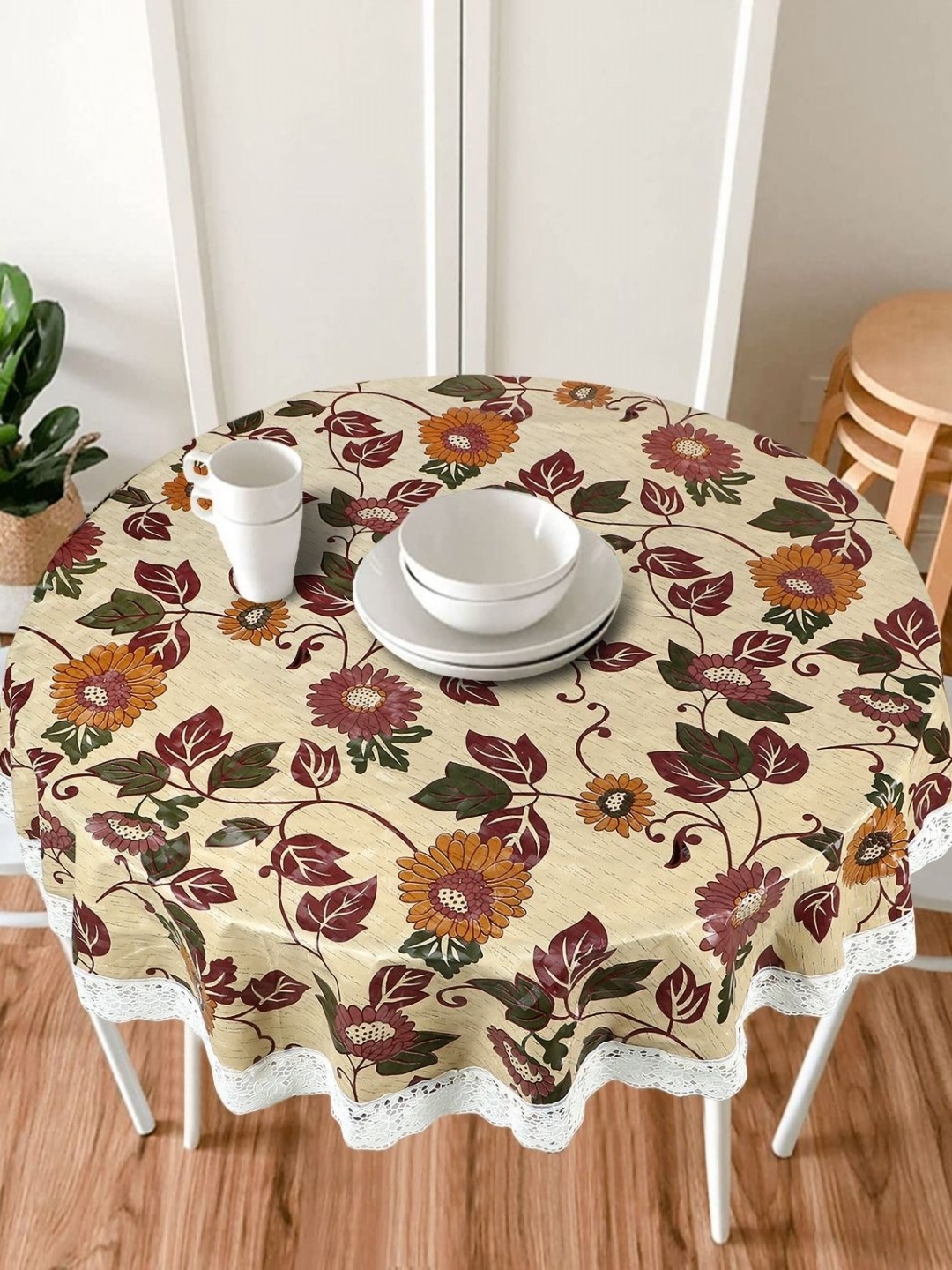 

Dakshya Industries Yellow Floral Printed Waterproof Round 4-Seater Table Cover