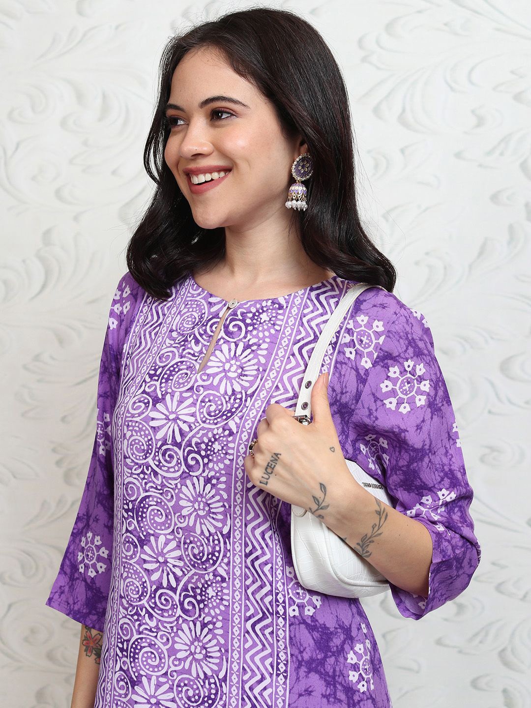 

Vishudh Purple & White Floral Printed Straight Kurta