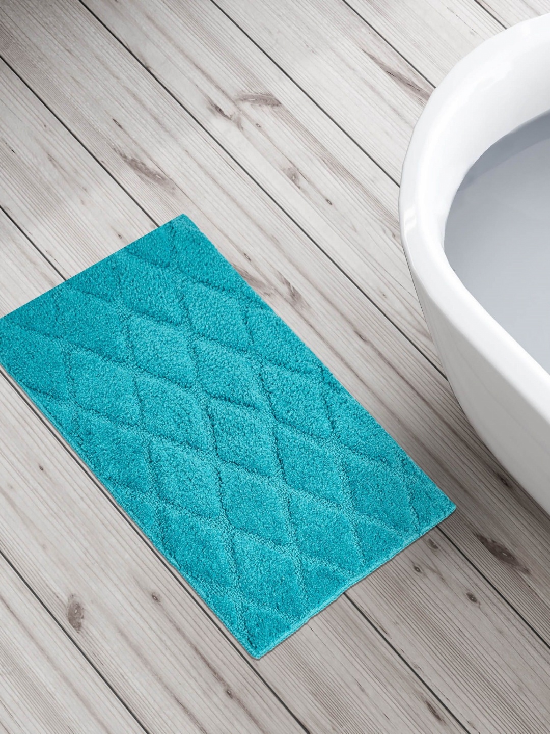 

Home Centre Teal Textured Anti Skid 110 GSM Bath Rugs