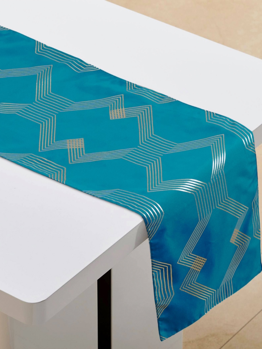 

Home Centre Teal Blue Foil Printed Table Runner