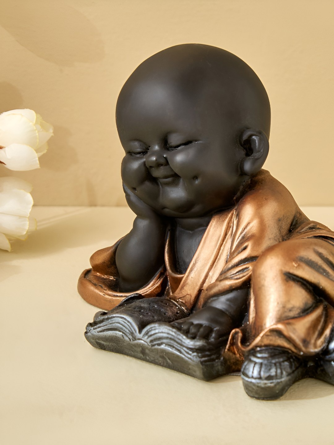 

Home Centre Black Religious Idol Showpiece