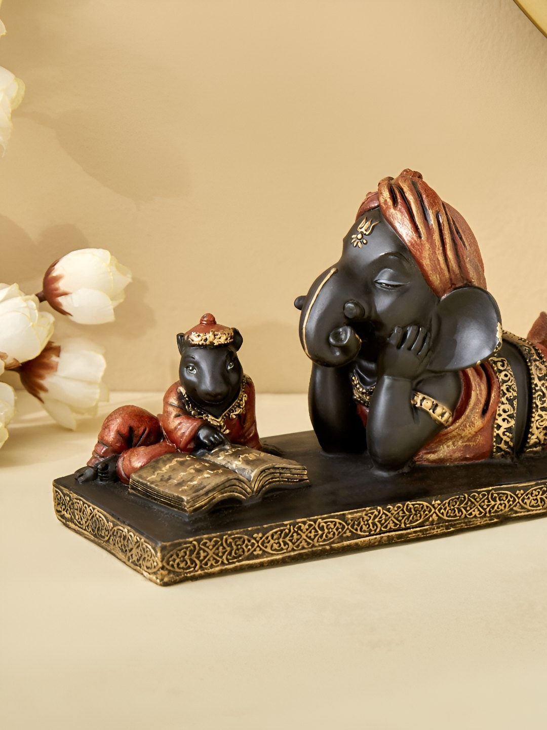 

Home Centre Black Religious Idol Showpiece