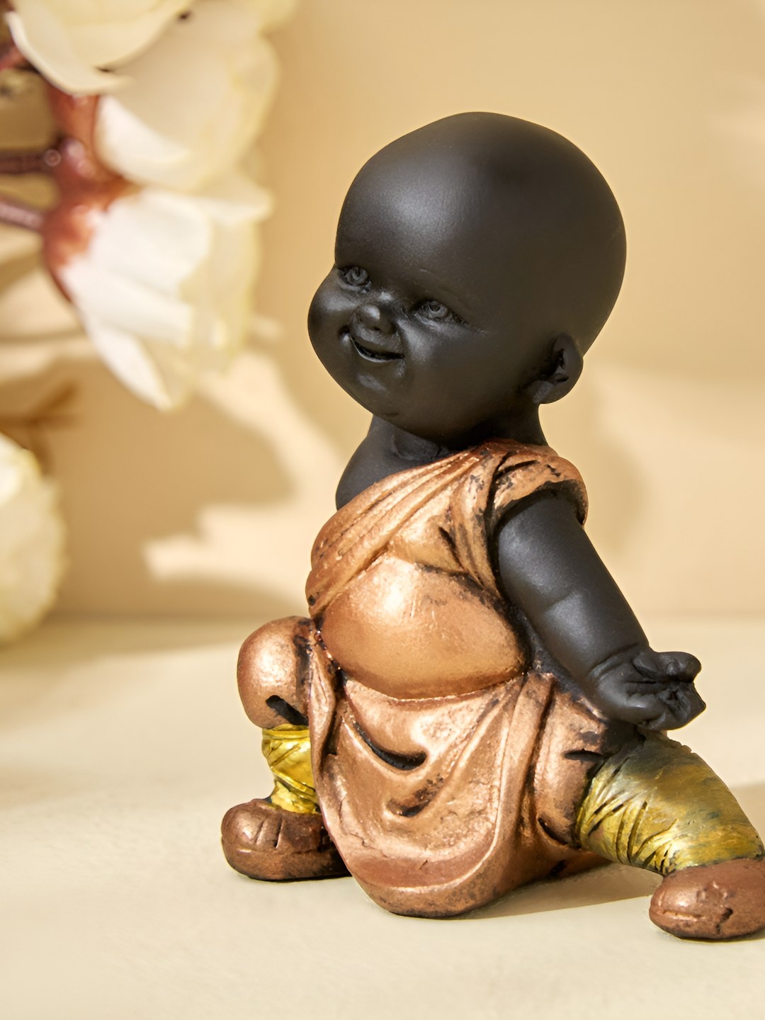 

Home Centre Black Religious Idol Showpiece