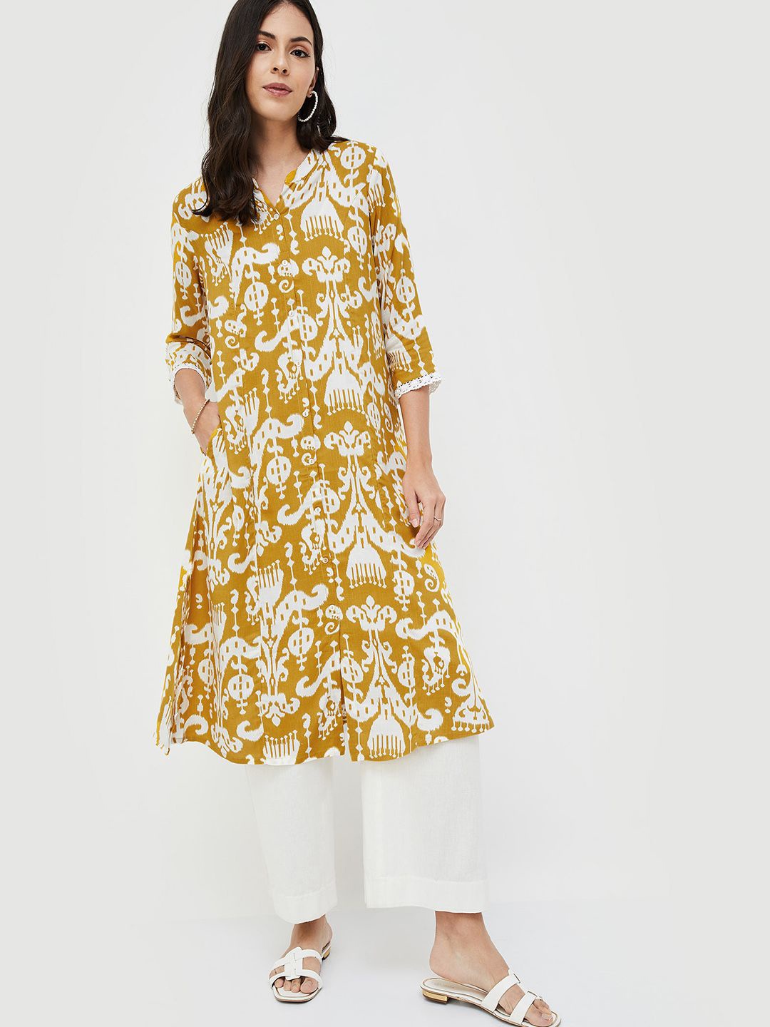 

Melange by Lifestyle Women Printed Keyhole Neck Kurta, Yellow