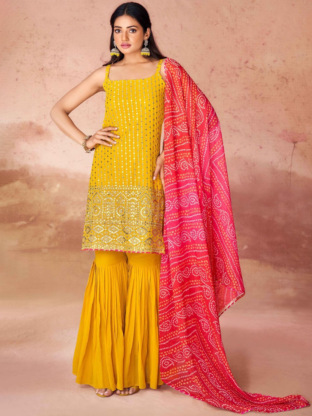 

ODETTE Women Ethnic Motifs Embroidered Regular Kurti with Sharara & With Dupatta, Mustard