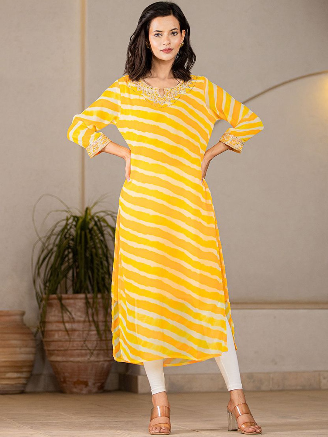 

Yufta Women Striped Flared Sleeves Georgette Kurta, Yellow