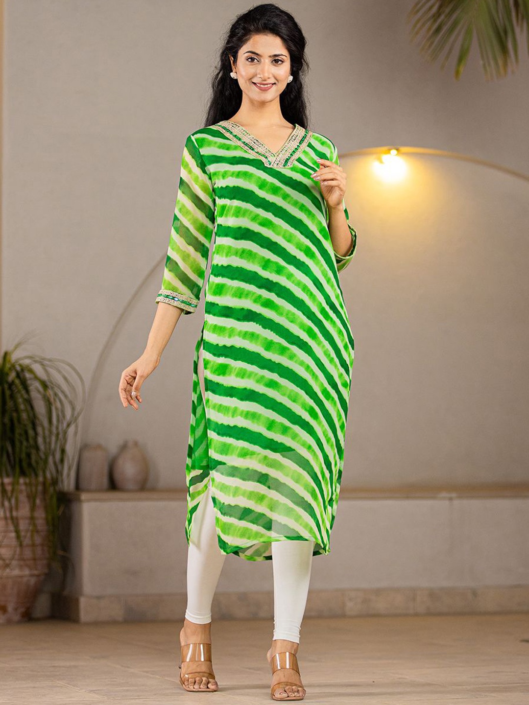 

Yufta Women Striped Flared Sleeves Mirror Work Georgette Kurta, Green