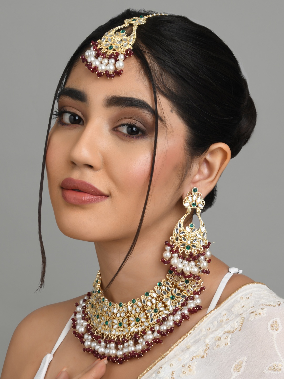 

Fida Gold-Plated Stone-Studded & Beaded Jewellery Set