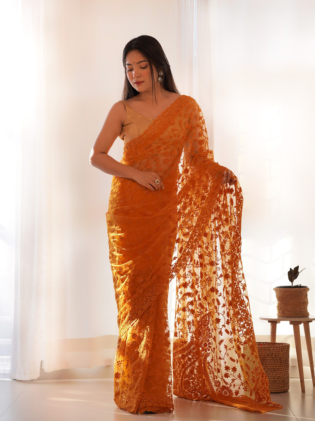 

Munir Floral Beads and Stones Net Saree, Yellow