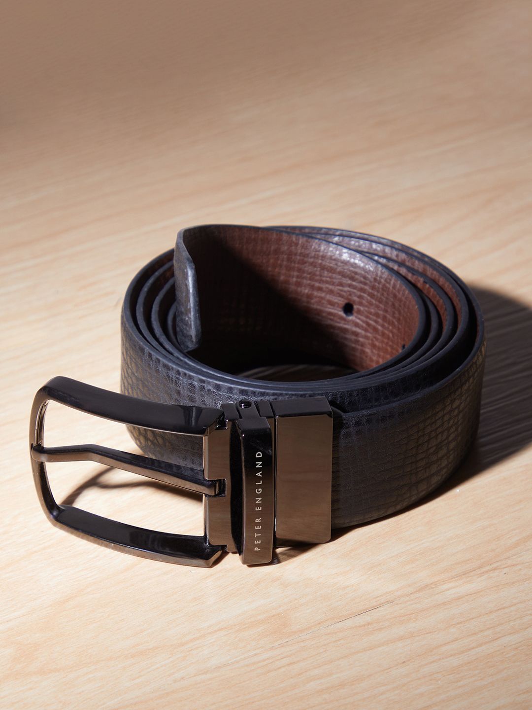 

Peter England Men Textured Leather Formal Belt, Navy blue