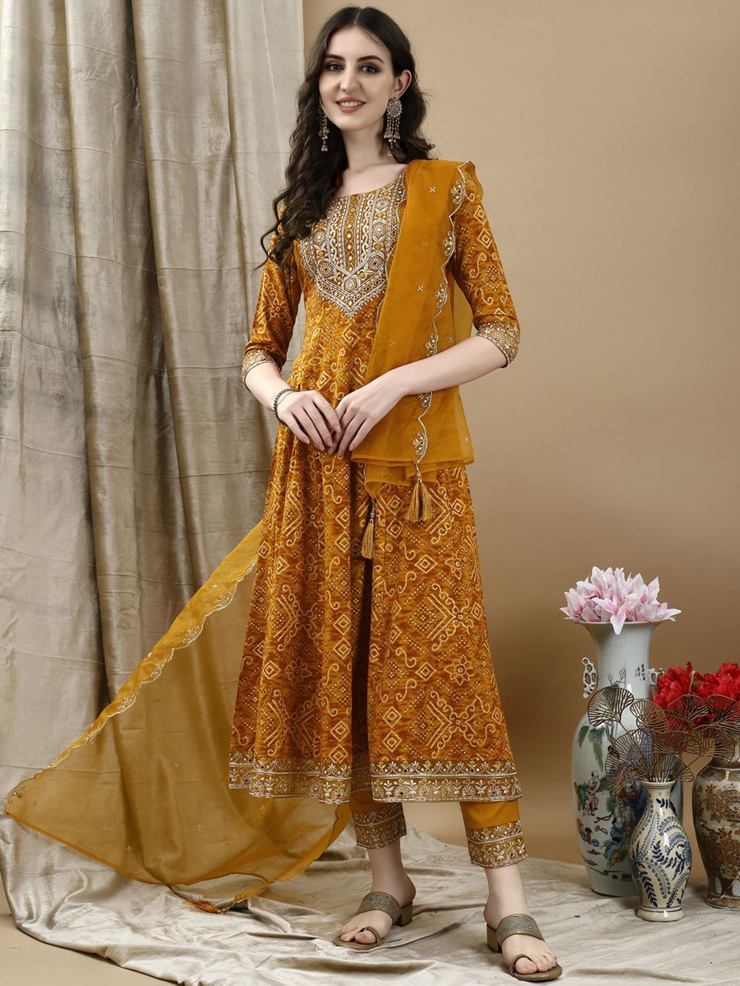 

KALINI Women Floral Embroidered Regular Sequinned Kurta with Trousers & With Dupatta, Mustard