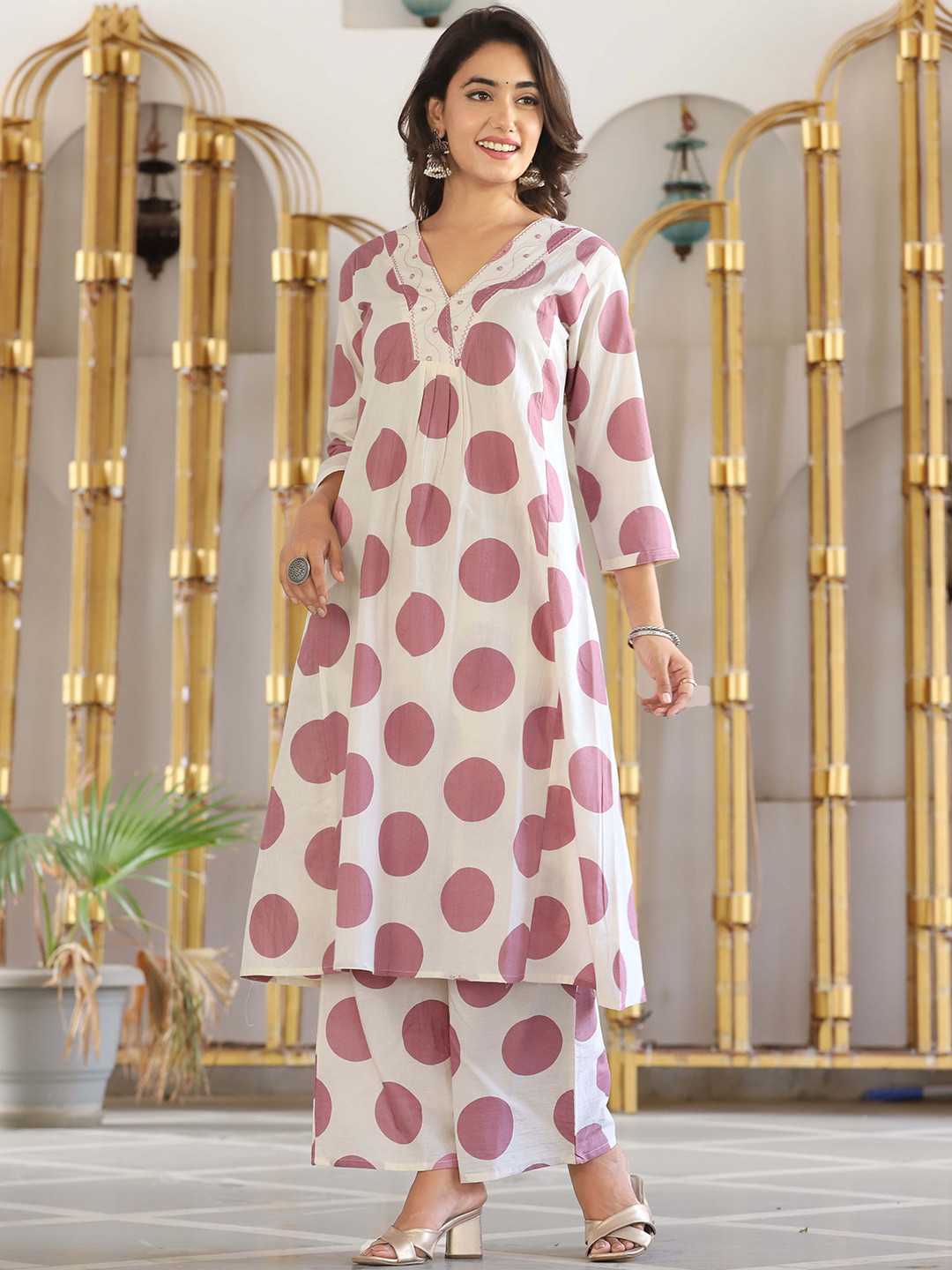 

KALINI Women Floral Printed Regular Kurta with Palazzos, Purple