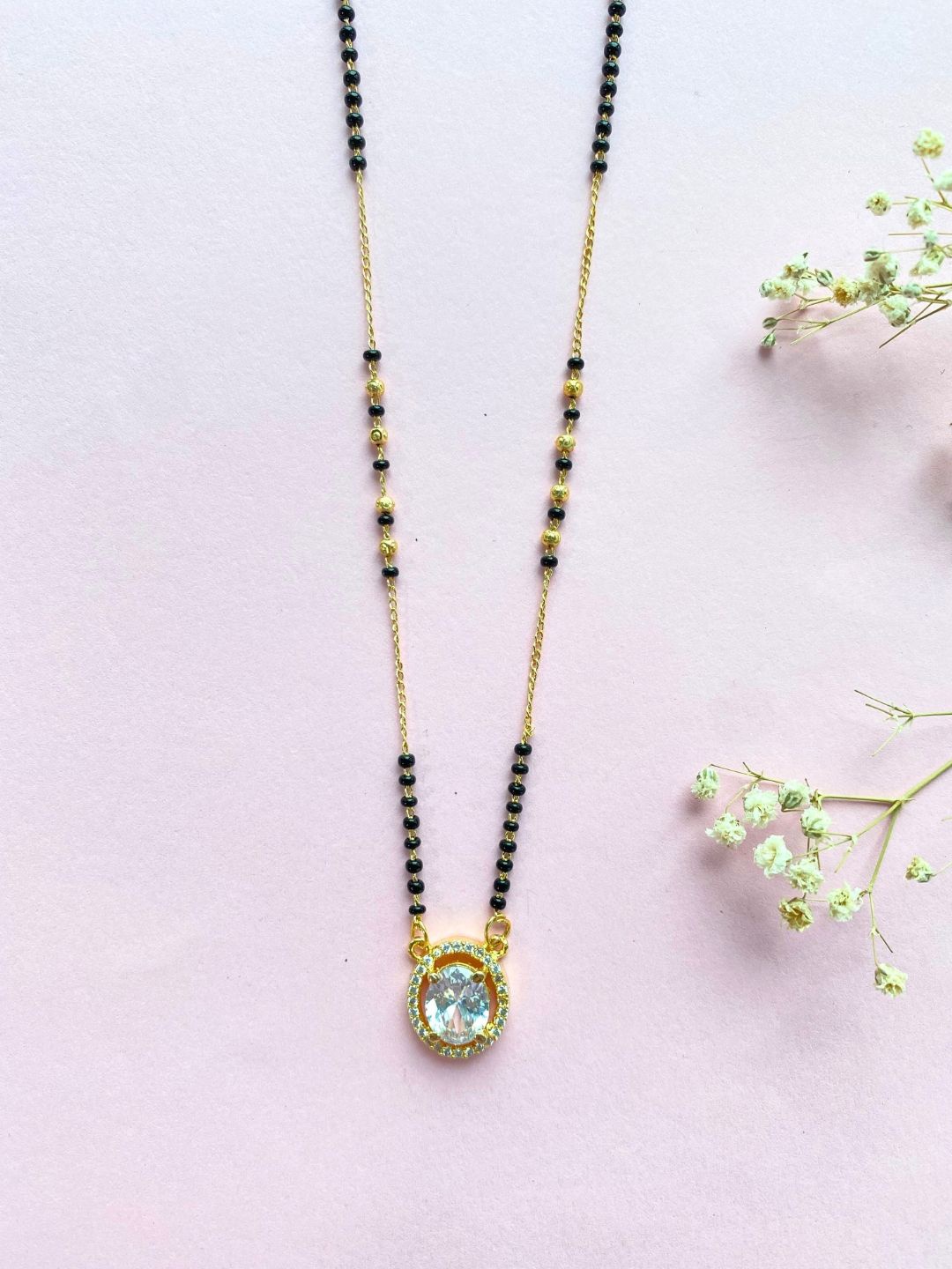

Zeraki Jewels Gold-Plated Artificial Stones and Beads Mangalsutra