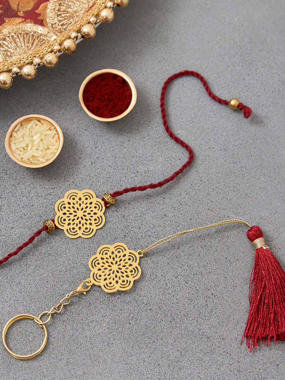 

DecorTwist Brass Flower Design Rakhi with Keychain, Gold