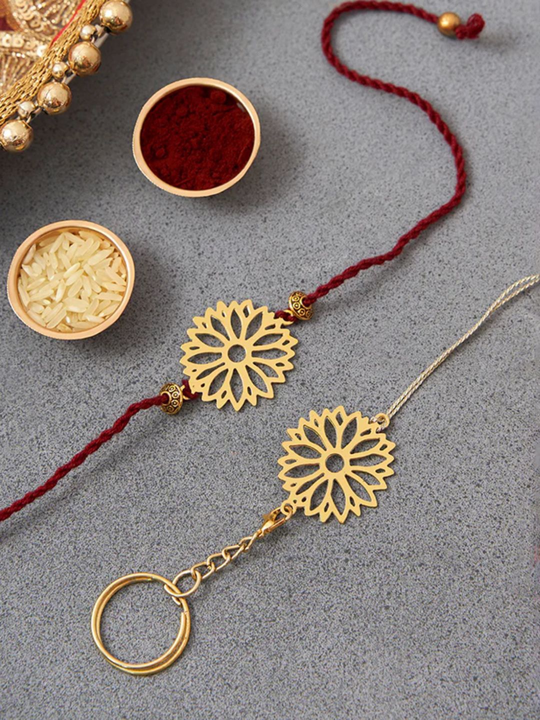 

DecorTwist Brass Sun Flower Design Rakhi with Keychain, Gold