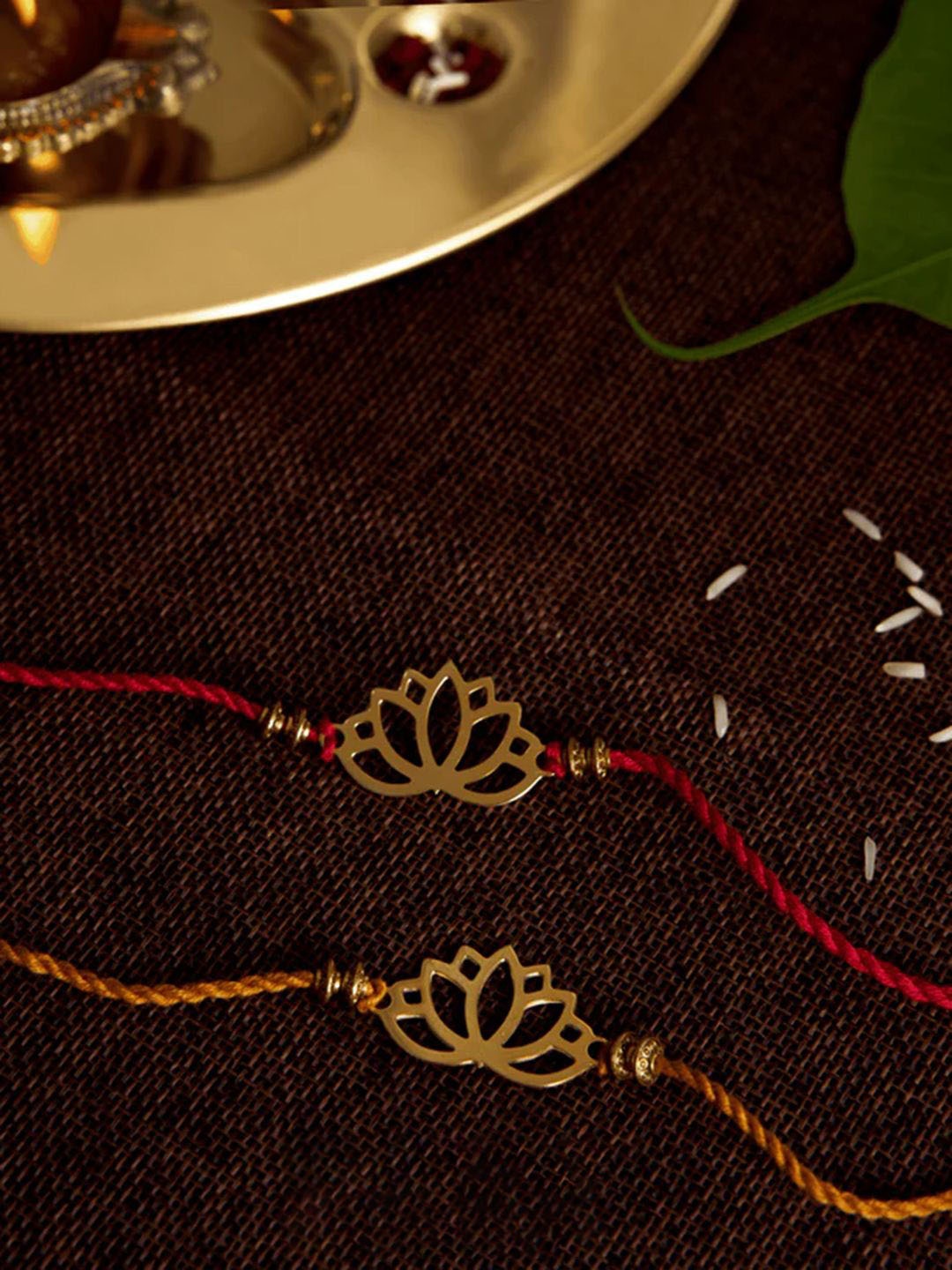 

DecorTwist Brass Lotus Design Rakhi with Keychain, Gold