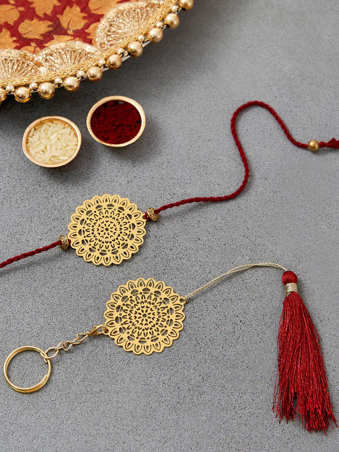 

DecorTwist Brass Flower Design Rakhi with Keychain, Gold