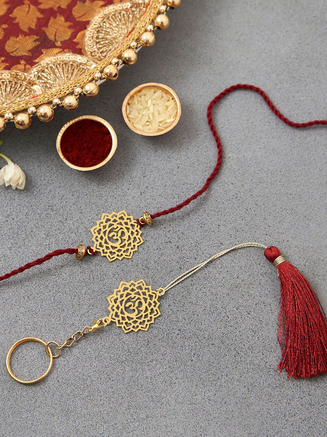 

DecorTwist Brass Om Design Rakhi with Keychain, Gold